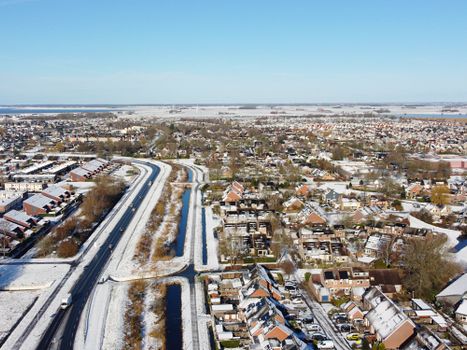 Weerbericht voor Oogophuizen met donkere herfstwolken boven het buitengebied richting Blaricum
